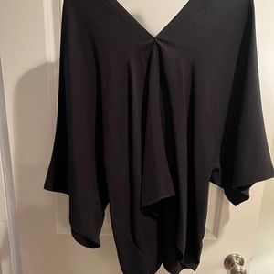 Bought at Anthropologie. One size. Black V neck top.